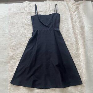 Black, spaghetti strap, tea-length linen dress. Y2K.